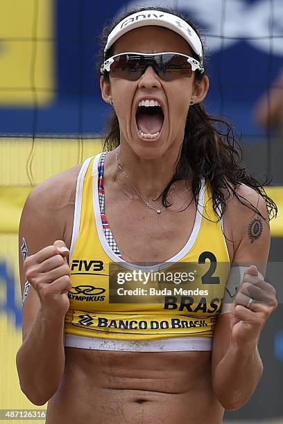 Talita Antunes of Brazil celebrates after winning her Rio Open women's beach volleyball final match against compatriots Agatha Bednarczuk and Barbara...