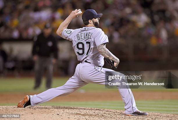 Joe Beimel of the Seattle Mariners pitches against the Oakland Athletics in the bottom of the ninth inning at O.co Coliseum on September 5, 2015 in...