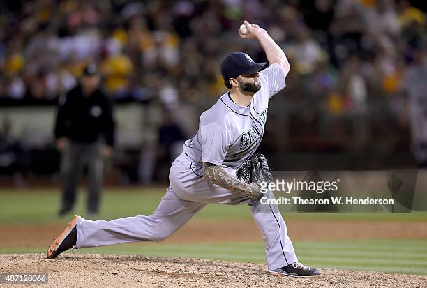 Joe Beimel of the Seattle Mariners pitches against the Oakland Athletics in the bottom of the ninth inning at O.co Coliseum on September 5, 2015 in...