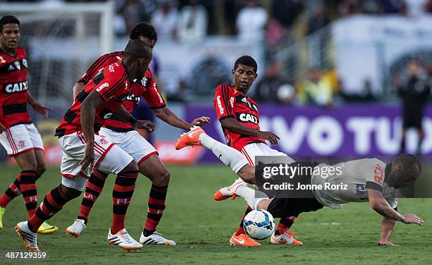 Guilherme Torres of Corinthians and Marcio Araujo of Flamengo during the Brasileirao Series A 2014 match between Corinthians and Flamengo at Pacaembu...