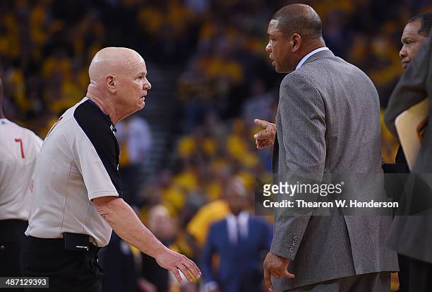 Head Coach Doc Rivers of the Los Angeles Clippers complains to official Joe Crawford after Rivers was called for a techical foul by official Derrick...