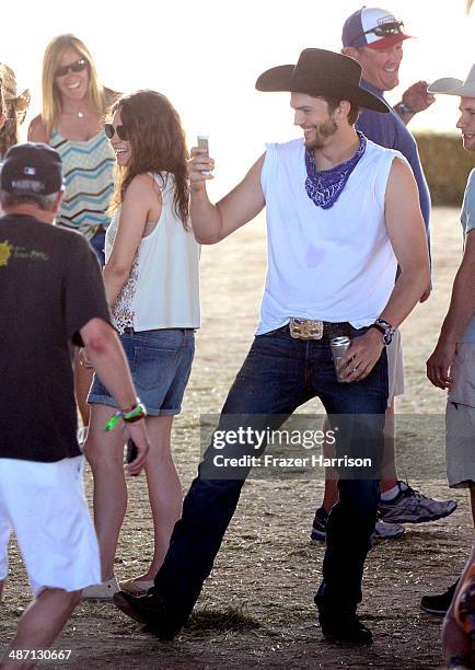 Actors Mila Kunis and Ashton Kutcher seen during day 3 of 2014 Stagecoach: California's Country Music Festival at the Empire Polo Club on April 27,...