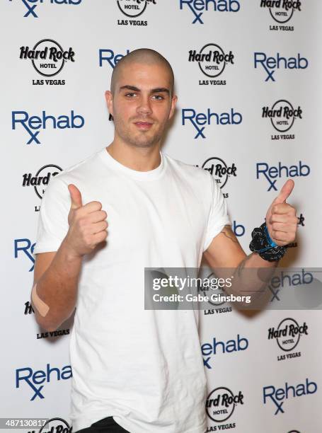 Singer Max George of The Wanted gives a thumbs up gesture as he arrives at the Hard Rock Hotel & Casino during the resort's Rehab pool party on April...