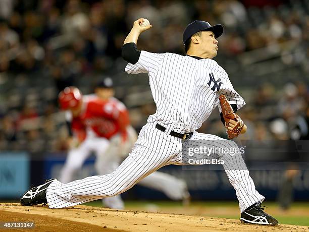 Masahiro Tanaka of the New York Yankees delivers a pitch in the first inning against the Los Angeles Angels of Anaheim on April 27, 2014 at Yankee...