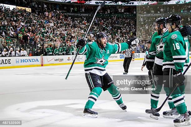 Trevor Daley and Ryan Garbutt of the Dallas Stars celebrate a goal against the Anaheim Ducks in Game Six of the First Round of the 2014 Stanley Cup...