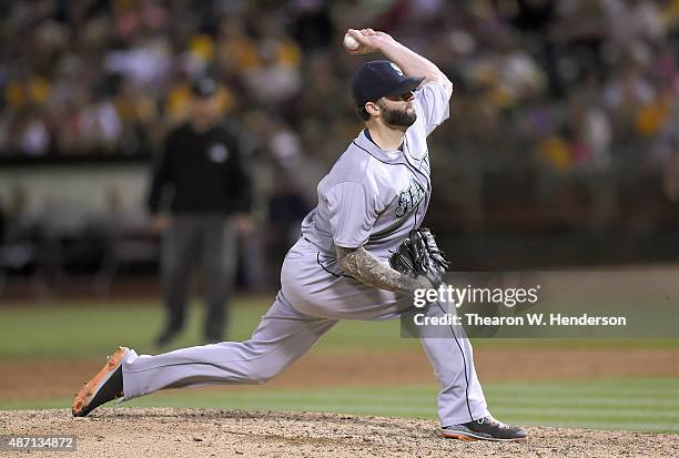 Joe Beimel of the Seattle Mariners pitches against the Oakland Athletics in the bottom of the ninth inning at O.co Coliseum on September 5, 2015 in...