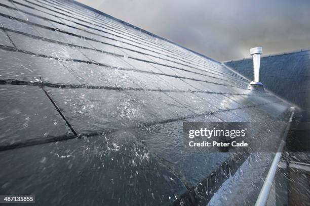 rain hitting roof - rainy weather stock pictures, royalty-free photos & images