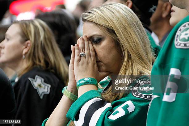 Dallas Stars fan is dejected after a loss to the Anaheim Ducks in Game Six of the First Round of the 2014 Stanley Cup Playoffs at the American...