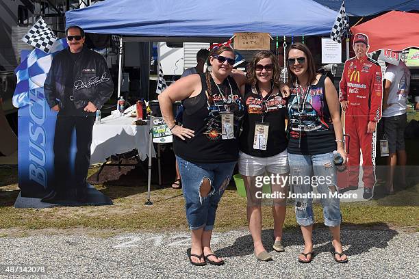 Fans pose in the infield campground while taking in festivities prior to the NASCAR Sprint Cup Series Bojangles' Southern 500 at Darlington Raceway...