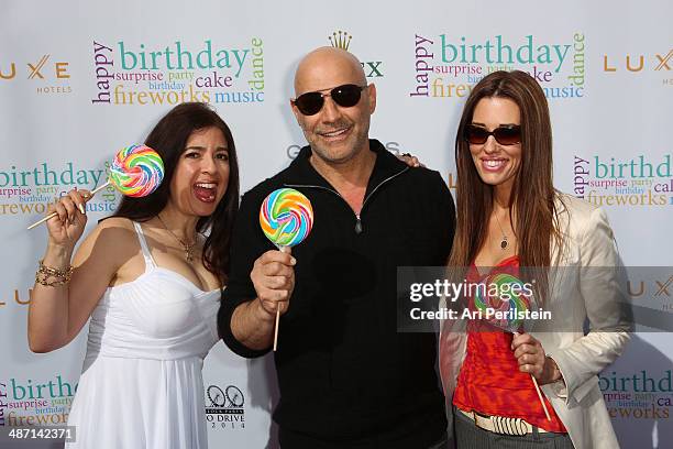 Personality Dominique Pinassi, TV Personality Yossi Dani and TV Personality Cory Oliver attends BH100 Centennial Block Party On Rodeo Drive on April...