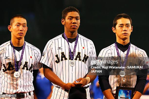 Outfielder Louis Okoye of Japan reacts after losing in the Gold Medal game between Japan and USA during the 2015 WBSC U-18 Baseball World Cup at the...