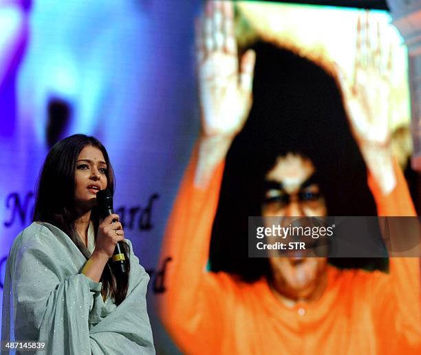 Indian Bollywood film actress Aishwarya Rai Bachchan speaks during the commemoration of the third death anniversary of Indian guru and spiritual...