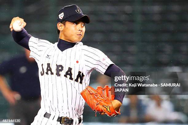 Pitcher Shotaro Ueno pitches in the top half of the sixth inning in the Bronze Medal/Gold Medal game between Japan and USA during the 2015 WBSC U-18...