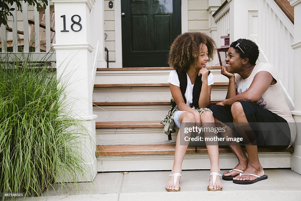 Mom and daughter laughing