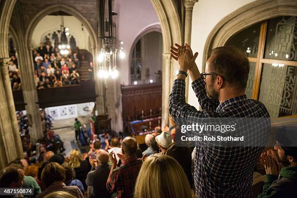 Jeremy Corbyn, MP for Islington North and candidate in the Labour Party leadership election, is applauded by supporters at Great St Mary's church on...