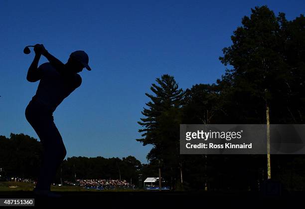 Henrik Stenson of Sweden hits his tee shot on the 18th hole during round three of the Deutsche Bank Championship at TPC Boston on September 6, 2015...