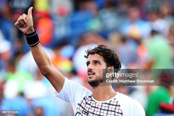Feliciano Lopez of Spain celebrates after defeating Fabio Fognini of Italy during their Men's Singles Fourth Round match on Day Seven of the 2015 US...