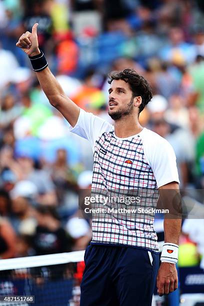 Feliciano Lopez of Spain celebrates after defeating Fabio Fognini of Italy during their Men's Singles Fourth Round match on Day Seven of the 2015 US...