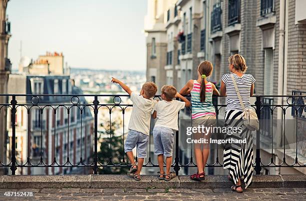 family visiting paris, montmartre - walking around the french capital stock pictures, royalty-free photos & images