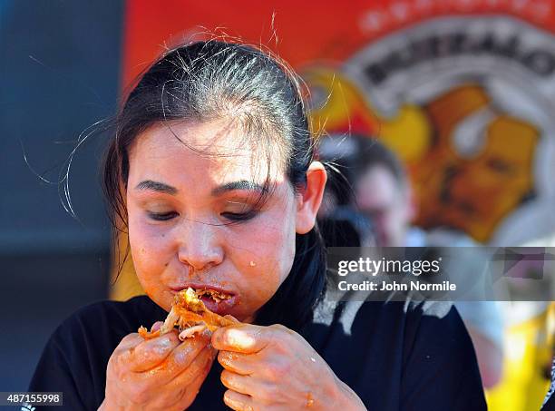 Competetive eater Sonya Thomas competes in the national chicken wing eating contest on September 6, 2015 in Buffalo, New York.The contest is a...