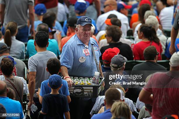 Beer vendor sells beer in the stands during the game between the San Francisco Giants and Chicago Cubs at Wrigley Field on Saturday, August 8, 2015...