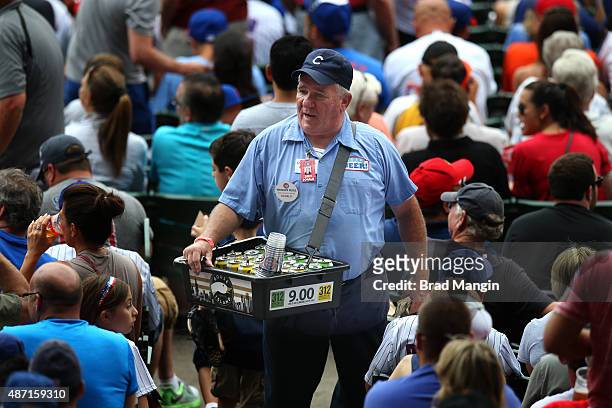 Beer vendor sells beer in the stands during the game between the San Francisco Giants and Chicago Cubs at Wrigley Field on Saturday, August 8, 2015...