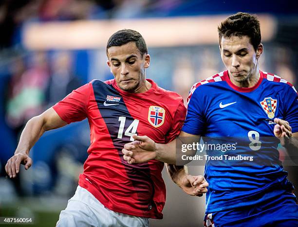 September 06: Omar Elabdellaoui of Norway Marko Pjaca of Croatia during the EURO 2016 Qualifier between Norway and Croatia at the Ullevaal Stadion on...