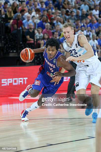 Mickael Gelabale of France tries to drive to the basket against Adin Vrabac of Bosnia and Herzegovina during the EuroBasket Group Phase game between...