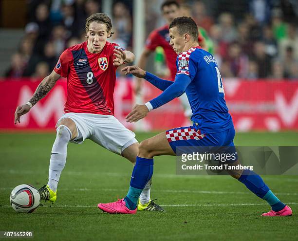September 06: Stefan Johanson of Norway, Ivan Perisic of Croatia during the EURO 2016 Qualifier between Norway and Croatia at the Ullevaal Stadion on...