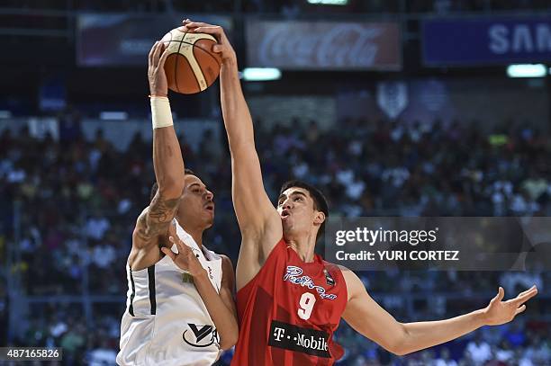 Puerto Rico's center Bryan Diaz vies for the ball with Mexico's small forward Juan Toscano during a 2015 FIBA Americas Championship Men's Olympic...