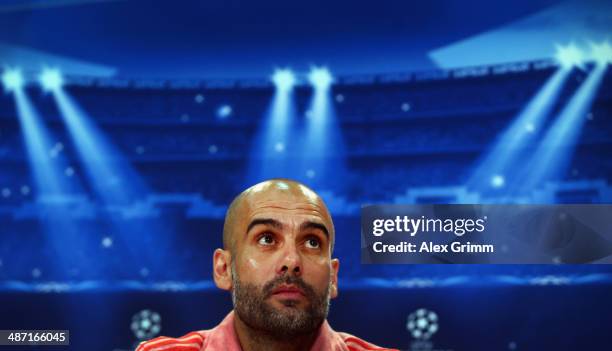 Head coach Pep Guardiola looks on during the FC Bayern Muenchen press conference ahead of their UEFA Champions League semi-final second leg match...
