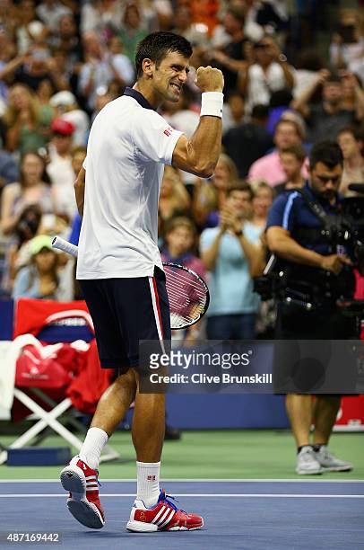 Novak Djokovic of Serbia celebrates to the crowd after his four set victory against Roberto Bautista Agut of Spain in their mens singles fourth round...