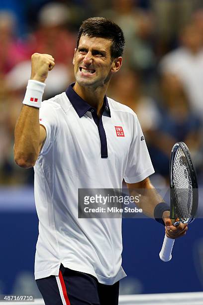 Novak Djokovic of Serbia celebrates after his victory against Roberto Bautista Agut of Spain during their Men's Single Fourth Round Match on Day...