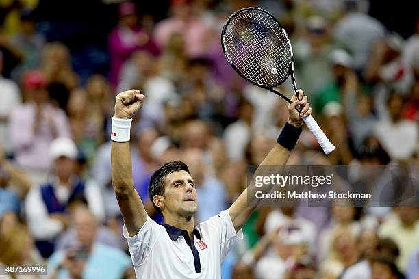 Novak Djokovic of Serbia celebrates his win over Roberto Bautista Agut of Spain during their Men's Singles Fourth Round match on Day Seven of the...