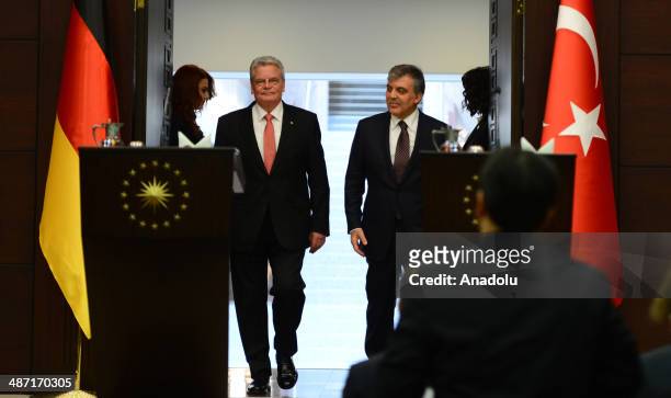 Turkish President Abdullah Gul and his German counterpart Joachim Gauck arrive for a joint press conference following their meeting at the Cankaya...