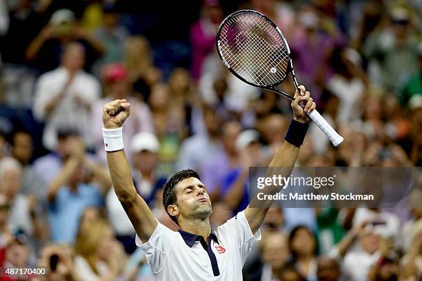 Novak Djokovic of Serbia celebrates his win over Roberto Bautista Agut of Spain during their Men's Singles Fourth Round match on Day Seven of the...