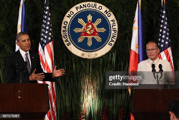 In this handout provided by Malacanang Photo Bureau', US president Barack Obama attends a joint press conference with Philippine President Benigno...