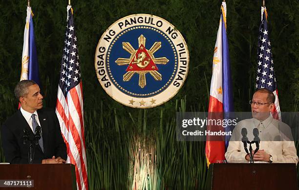 In this handout provided by Malacanang Photo Bureau', US president Barack Obama attends a joint press conference with Philippine President Benigno...