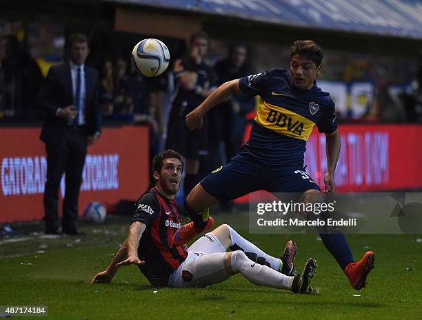 Sebastian Palacios of Boca Juniors leaves Ramiro Arias of San Lorenzo begind during a match between Boca Juniors and San Lorenzo as part of 23rd...