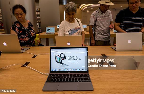 Chinese customers in an Apple store in Chongqing. Apple has experienced strong growth for the business in China through July and August. To continue...