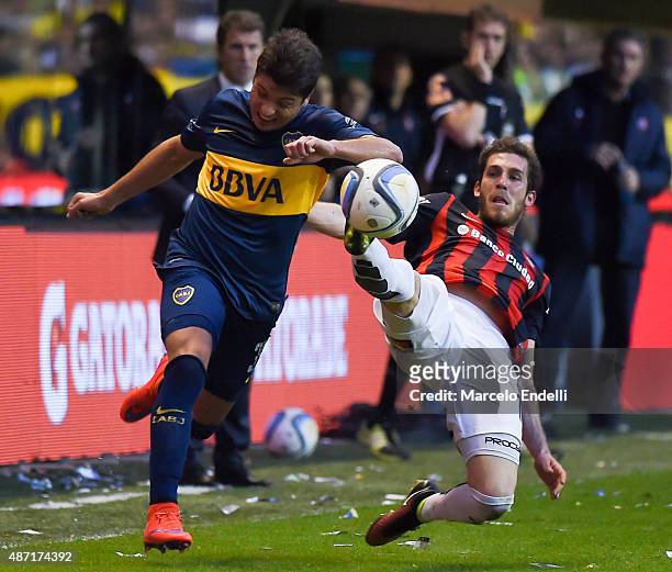 Sebastian Palacios of Boca Juniors and Ramiro Arias of San Lorenzo fight for ball during a match between Boca Juniors and San Lorenzo as part of 23rd...