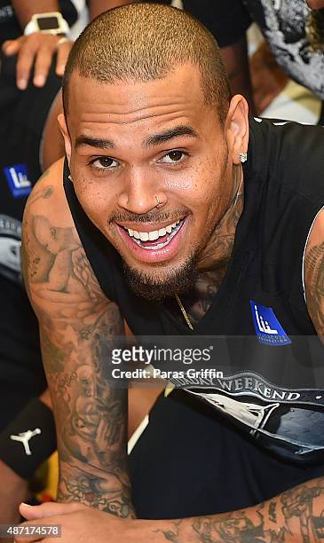 Recording artist Chris Brown attends LudaDay Weekend Annual Celebrity Basketball Game at Georgia State University Sports Arena on September 6, 2015...
