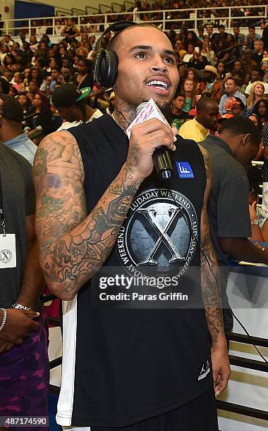 Recording artist Chris Brown attend LudaDay Weekend Annual Celebrity Basketball Game at Georgia State University Sports Arena on September 6, 2015 in...