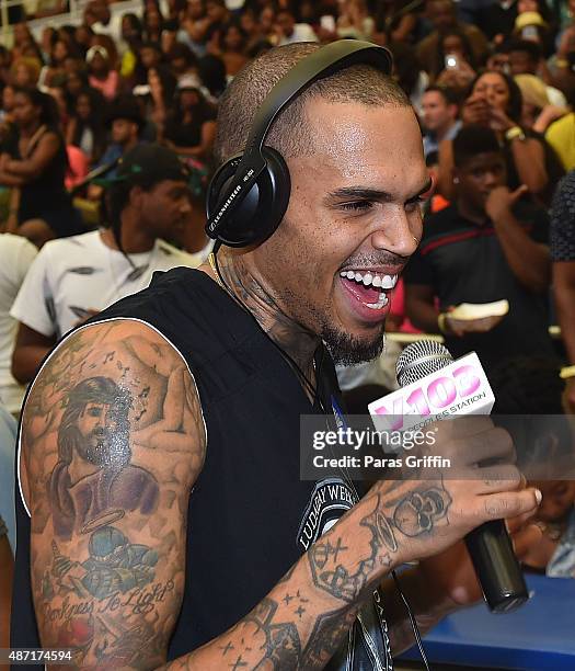 Recording artist Chris Brown attend LudaDay Weekend Annual Celebrity Basketball Game at Georgia State University Sports Arena on September 6, 2015 in...