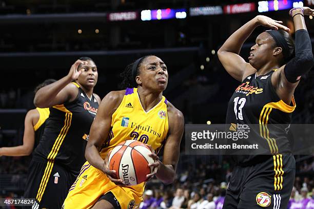 Nneka Ogwumike of the Los Angeles Sparks drives to the basket against Karima Christmas of the Tulsa Shock in a WNBA game at Staples Center on...