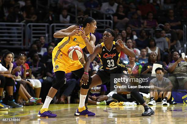 Candace Parker of the Los Angeles Sparks loses the ball against Tiffany Jackson-Jones of the Tulsa Shock in a WNBA game at Staples Center on...