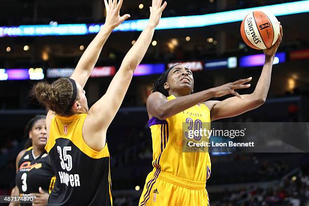 Nneka Ogwumike of the Los Angeles Sparks goes to the basket against Jordan Hooper of the Tulsa Shock in a WNBA game at Staples Center on September 6,...