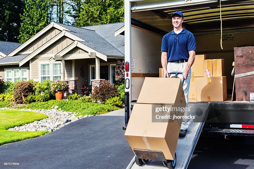 Delivery Man Unloading Truck