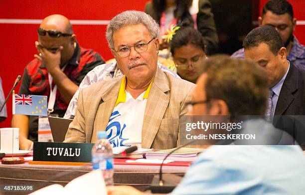 Tuvalu's Prime Minister Enele Sopoaga listens to a speaker during the Smaller Islands States Leaders meeting as part of the Pacific Islands Forum in...