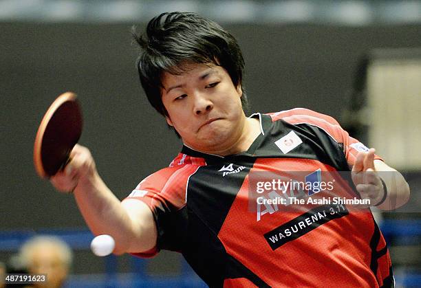 Seiya Kishikawa of Japan competes in the match against Panagiotis Gionis of Greece during day one of the 2014 World Team Table Tennis Championships...